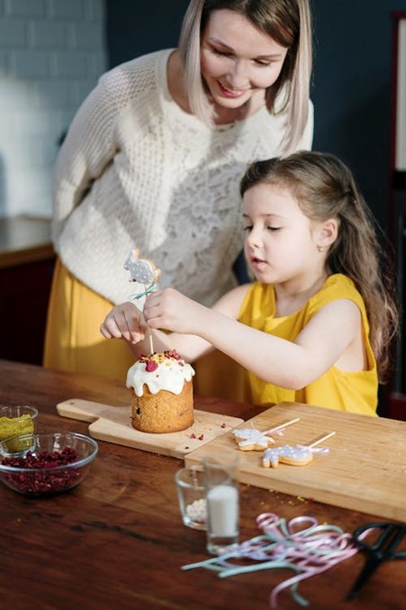 Children cooking, Judith Yeabsley|Fussy Eating NZ, girl decorating cup cakes, #ChildrenCookingFussyEaters, #ChildrenCookingPickyEaters, #TryNewFoods, #TheConfidentEater, #FussyEatingNZ, #HelpForFussyEating, #HelpForFussyEaters, #FussyEater, #FussyEating, #PickyEater, #PickyEating, #SupportForFussyEaters, #SupportForPickyEaters, #CreatingConfidentEaters, #TryNewFood #PickyEatingNZ #HelpForPickyEaters, #HelpForPickyEating, #Wellington, #NZ, #JudithYeabsley #RecipesPickyEatersWillEat, #RecipesFussyEatersWillEat